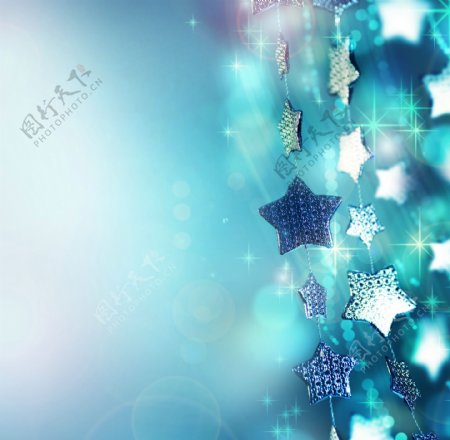 蓝色星星圣诞贺卡背景图片