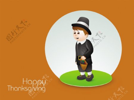感恩节快乐的概念与可爱的男孩拿着篮子充满橙色背景上的水果和蔬菜