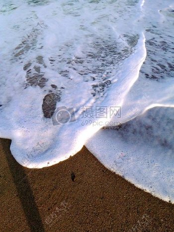 波沙海滩水哥斯达黎加海滩的沙子自然泡沫
