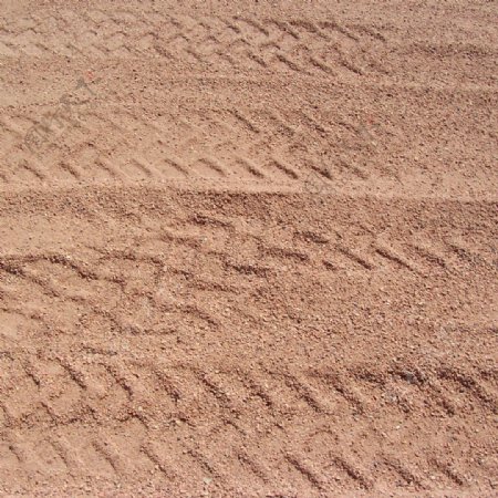 沙子地面轮胎印迹背景图片