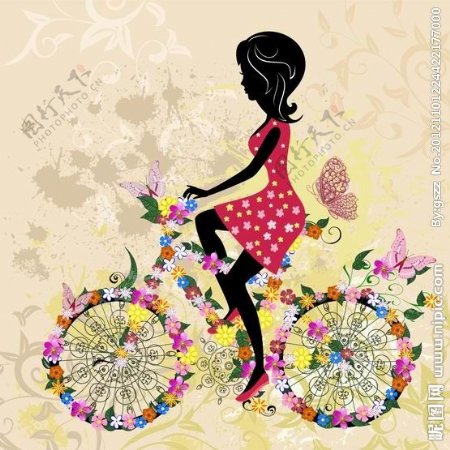 满身鲜花蝴蝶骑着自行车的美女图片
