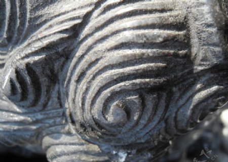 石雕纹理狮子头图片