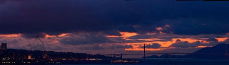 铁桥黄昏景色灯光灿烂城市风光图片
