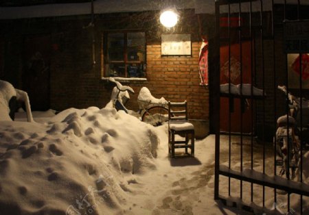 温馨灯光雪景图片