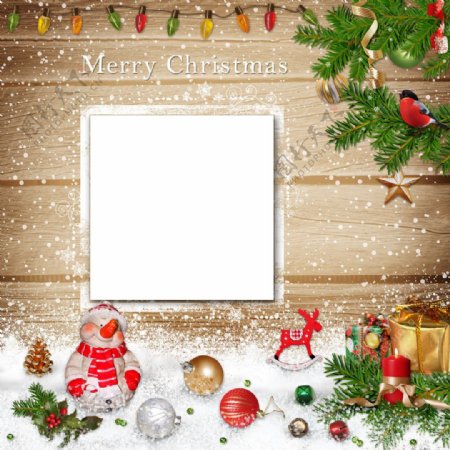 圣诞球与木板雪地背景图片