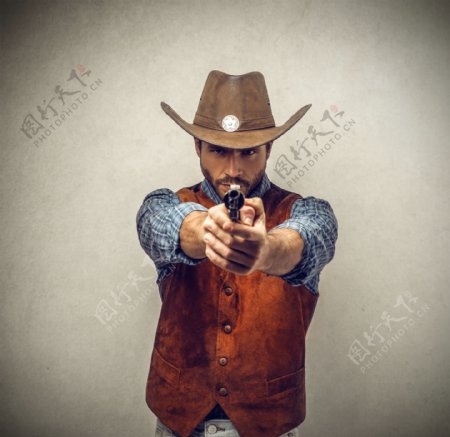 拿着枪的牛仔图片